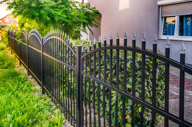 a scalloped iron fence in Greenwich, CT